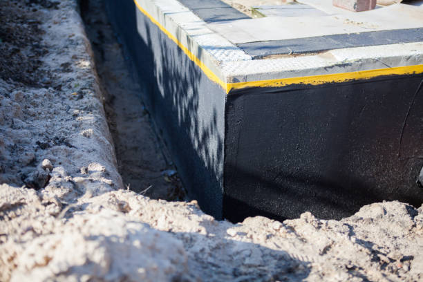 Professional Exterior Waterproofing technician working in Memphis, NY